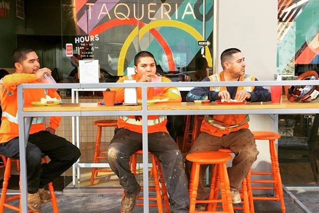 In-the-know locals, including these blue-collar workers, flock to Sonoratown in downtown Los Angeles for its tacos. Photo: Teo Diaz-Rodriguez