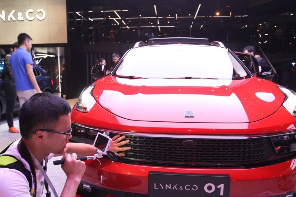 Visitors attend the 17th Shanghai International Automobile Industry Exhibition in Shanghai on April 19, 2017. Photo: Simon Song