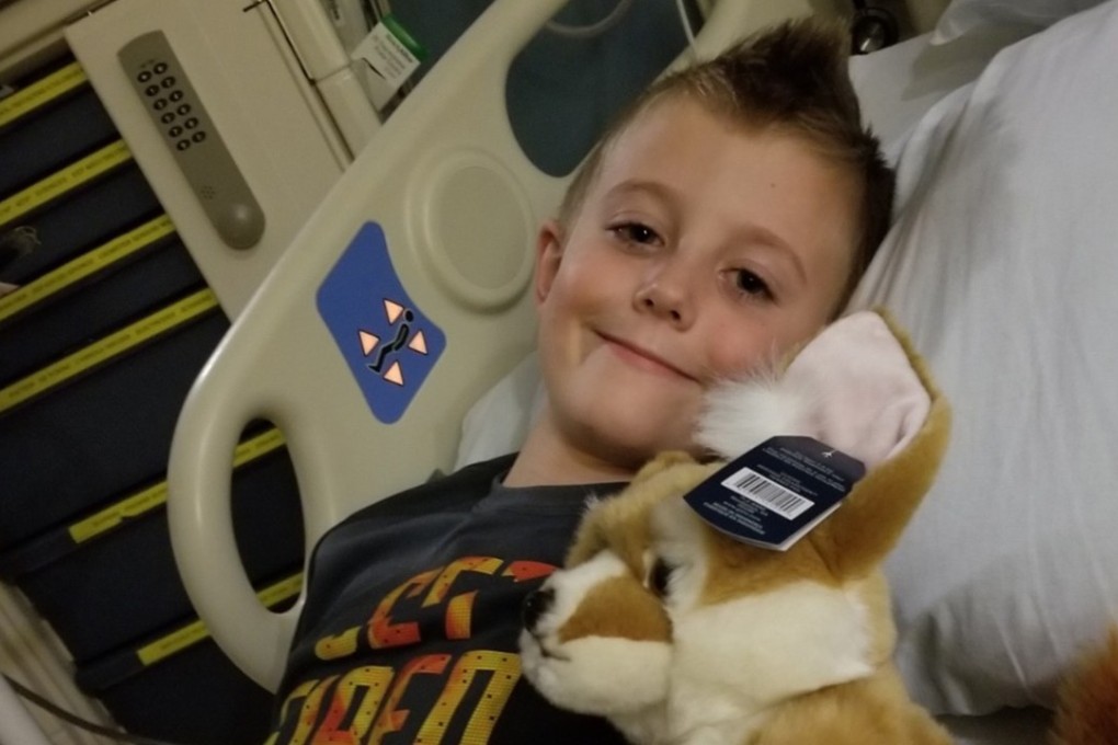 Quinton Hill, 7, lost movement in one arm last month due to a mysterious syndrome known as acute flaccid myelitis. He is being treated in Minnesota’s Children's Hospital. Photo: Courtesy of Hill family