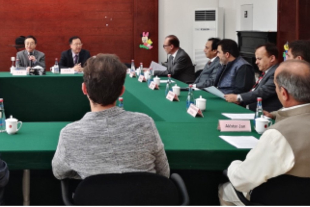 Consul general Shen Zicheng meets Uygur Chinese at the embassy in Pakistan. Photo: Embassy of China in Pakistan