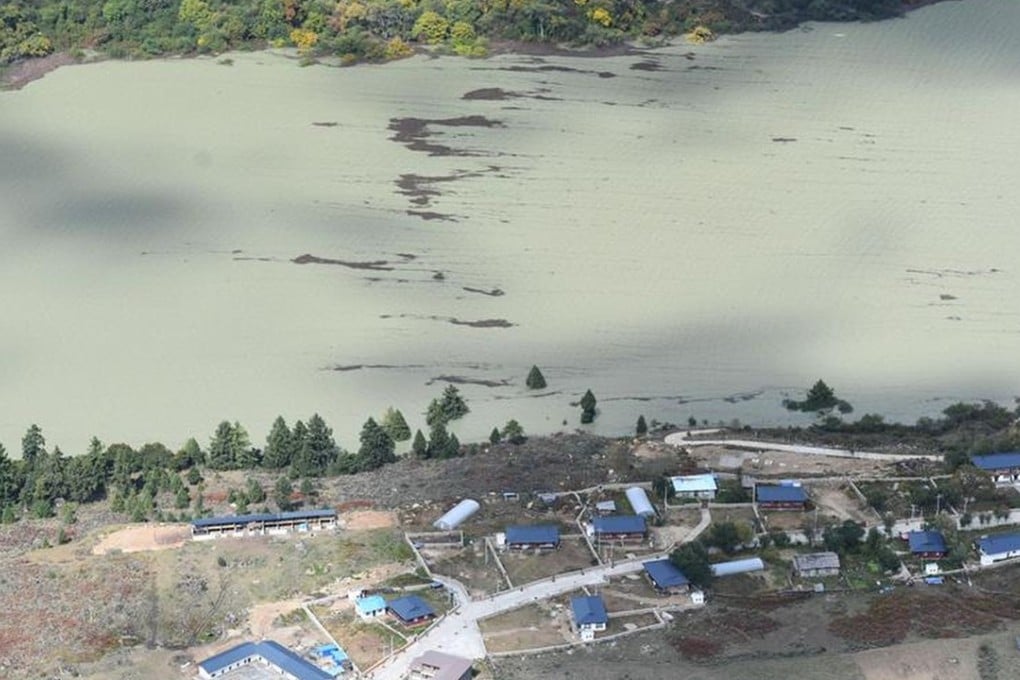 A village threatened by the landslide-caused barrier lake on the Yarlung Tsangpo River in Tibet on Thursday. Photo: Xinhua