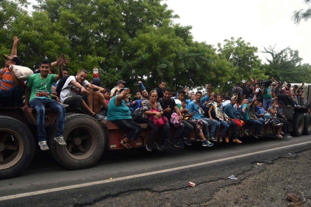 Honduran migrants take part in a ‘caravan’ towards the US in Chiquimula, Guatemala on October 17, 2018. Photo: AFP