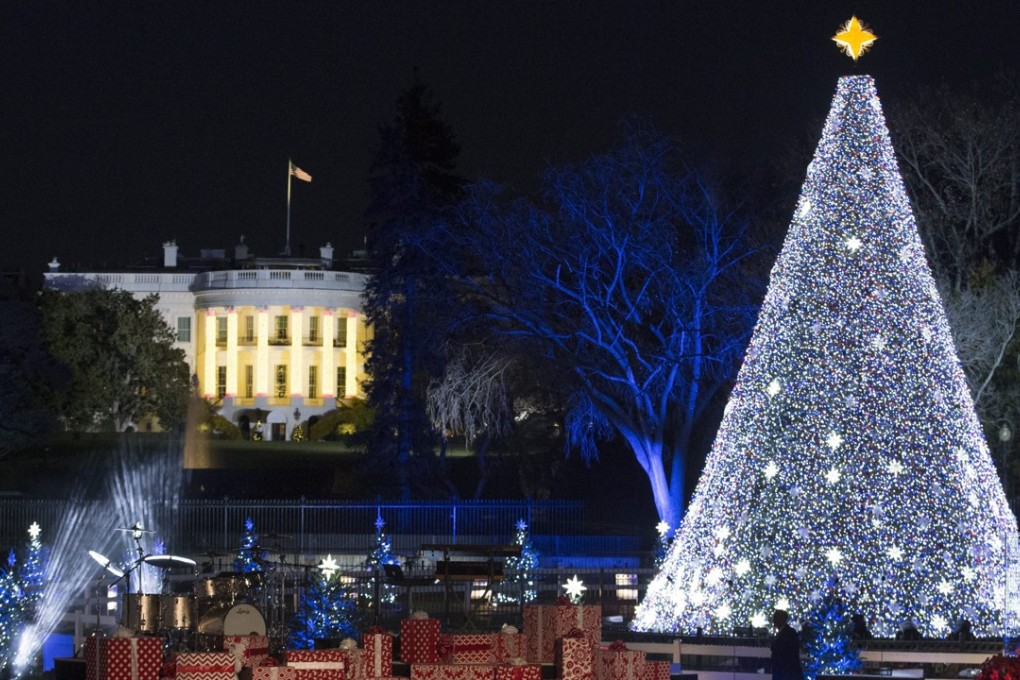 America’s National Christmas Tree on the Ellipse, near the White House (behind), in Washington, DC on 1 December 2016. The lighting of the tree is an annual tradition attended by the US President and the First Family. President Calvin Coolidge lit the first National Christmas tree, a 14.6 meter high Balsam fir, in 1923. Photo: EPA/MICHAEL REYNOLDS