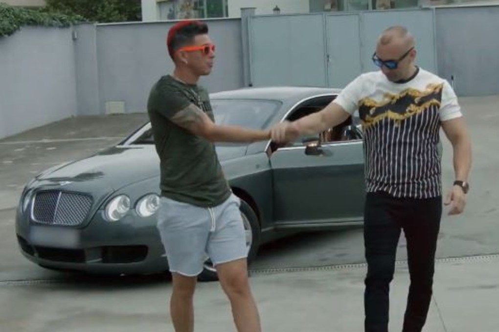 Francisco Tejon (right), one of Spain’s most wanted men has surrendered to police days after he surfaced in a reggaeton video featuring scantily clad women, a Bentley and a swimming pool. Photo: YouTube