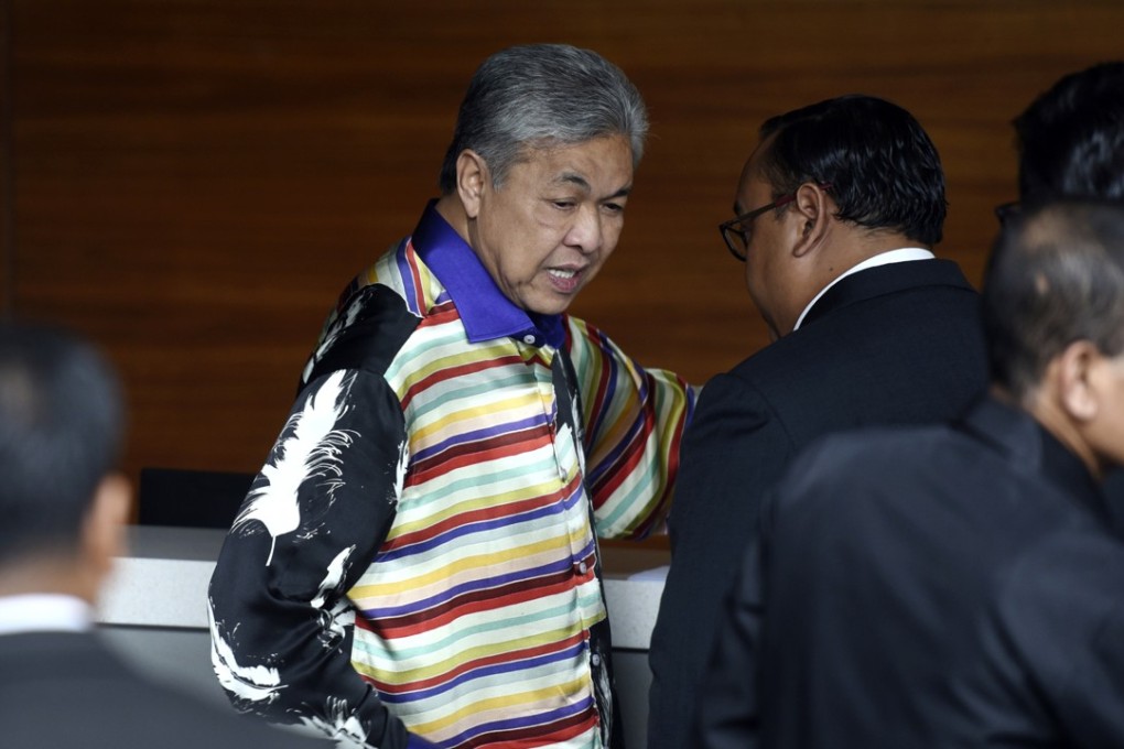 Former deputy prime minister Ahmad Zahid Hamidi arrives at Malaysia’s anti-corruption agency in Putrajaya on Thursday. Photo: AP