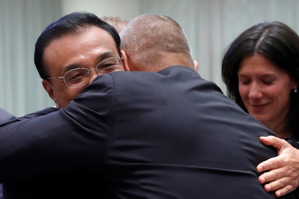 Bulgarian Prime Minister Boyko Borissov greets Chinese Premier Li Keqiang with a bear hug as they attend the ASEM leaders summit in Brussels, Belgium, on Thursday. Photo: Reuters