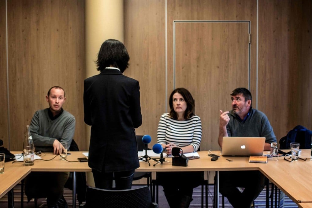 Grace Meng, the wife of the missing Interpol president Meng Hongwei, talks to journalists on October 7 in Lyon during a press conference during which she did not want her face to be shown. Photo: Agence France-Presse