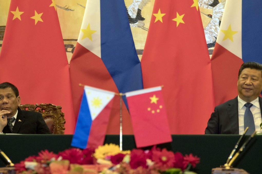 Rodrigo Duterte (left) and Xi Jinping will meet in Manila next month, with the two sides expected to sign major deals. Photo: AFP