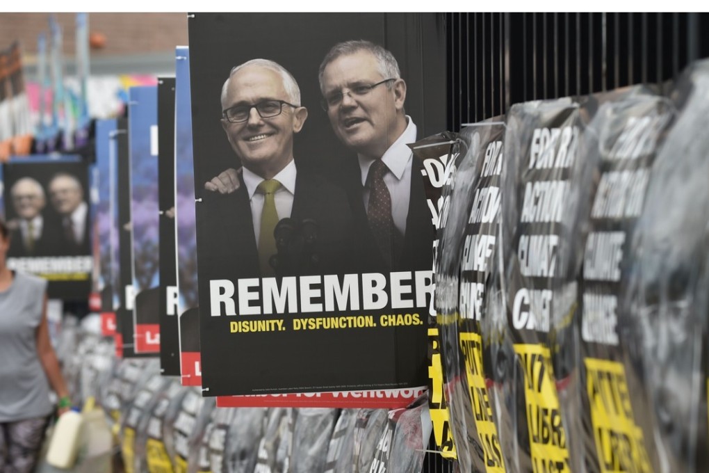 Election posters outside a Bondi beach polling station in Sydney. Photo: AFP