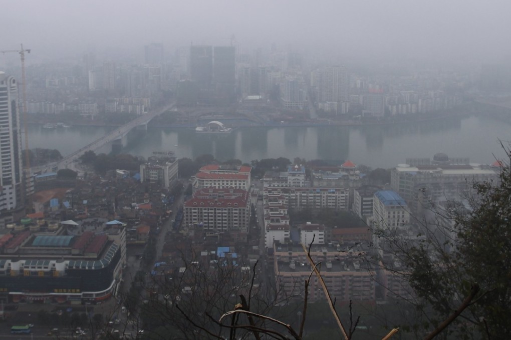 A smoggy day in Liuzhou, in the Guangxi Zhuang region. Guangxi was accused of failing to curb illegal waste imports. Photo: Simon Song