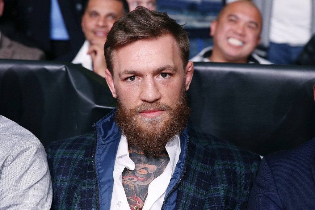 Conor McGregor sits ringside before the boxing match between Demetrius Andrade and Walter Kautondokwa in Boston on October 20. Photo: AP
