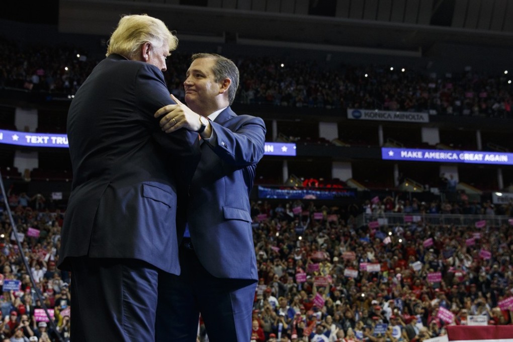 US President Donald Trump is greeted by Senator Ted Cruz as he arrives for a campaign rally in Houston. Photo: AP