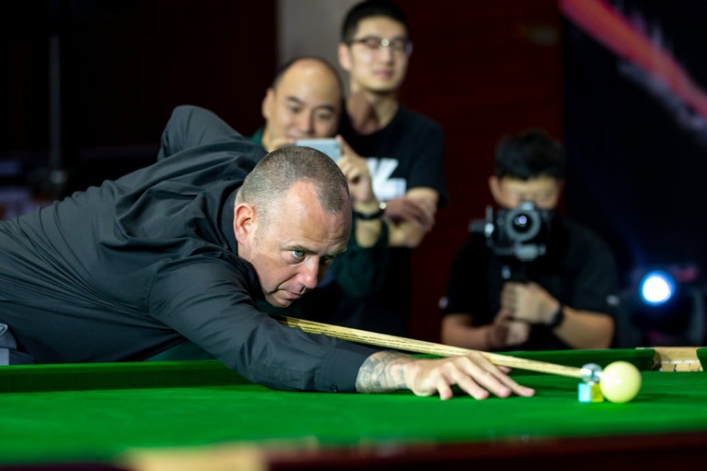Mark Williams plays a few shots while gathered media look on at the launch media conference at JW Marriott Macau on Tuesday. Photo: Macau Masters