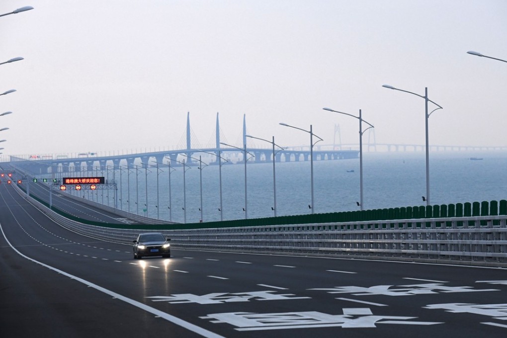 A car drives on the Hong Kong-Zhuhai-Macau Bridge. Photo: Xinhua