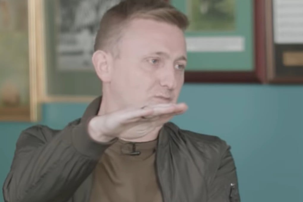 Derek Riordan gestures the length of the grass in China during his playing days. Photo: YouTube/Open Goal