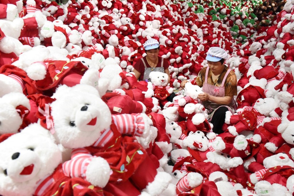 Workers make stuffed toys for export inside a factory in Linyi, Shandong province, China on June 26, 2018. Photo: Reuters