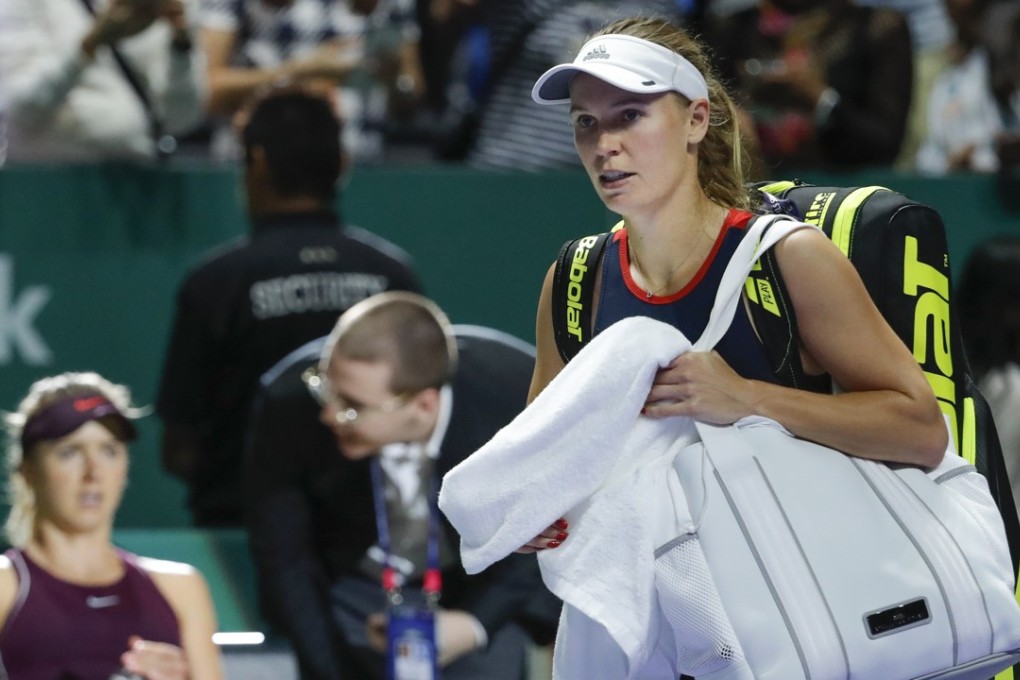 Caroline Wozniacki leaves after losing to Elina Svitolina at the WTA Finals in Singapore. Photo: AP