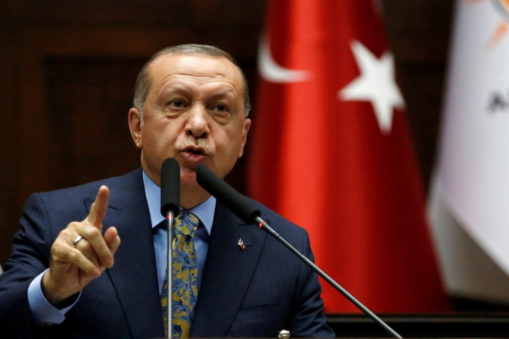 Turkish President Tayyip Erdogan addressing members of parliament in Ankara on October 23, 2018. Photo: Reuters