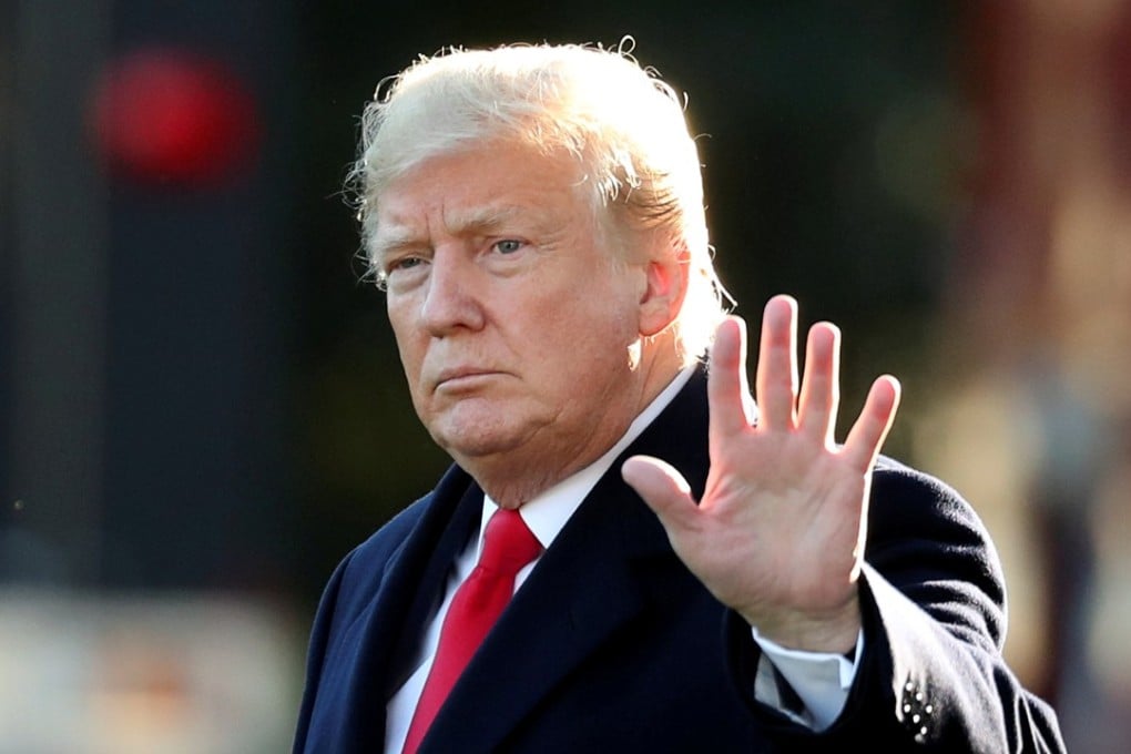 US President Donald Trump waves before leaving the White House for Wisconsin, on October 24, to campaign for Republican Senate candidate Leah Vukmir in the midterm elections. Photo: Reuters