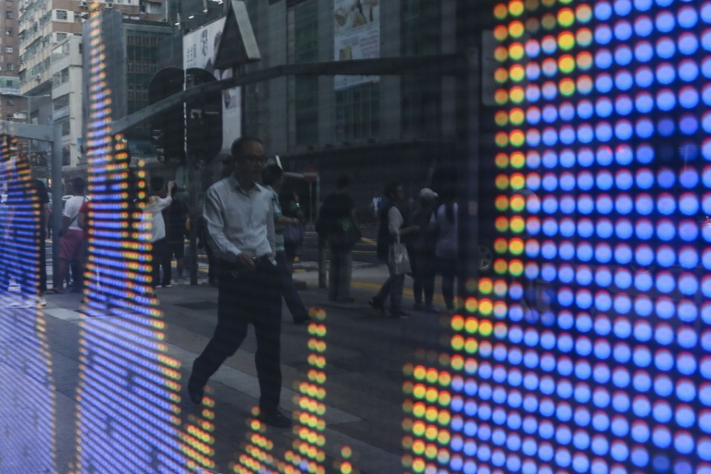 Hong Kong’s benchmark Hang Seng Index closed on Friday at a fresh 18-month low 24,717.63. Photo: Sam Tsang