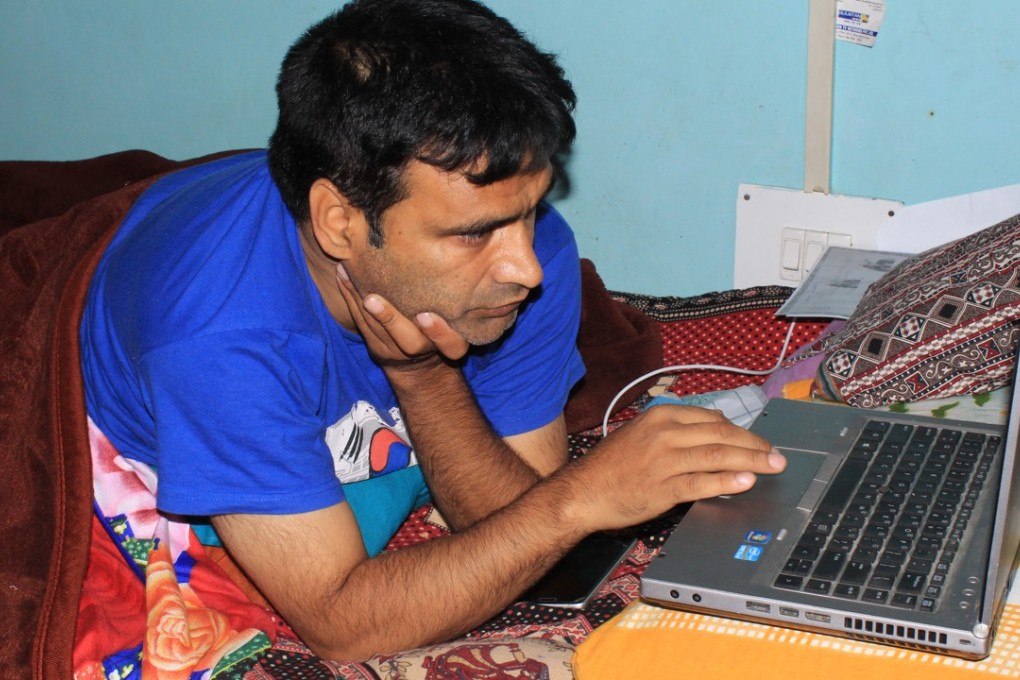 Javed Ahmad Tak was paralysed after being shot by masked gunmen. Photo: Saqib Mir