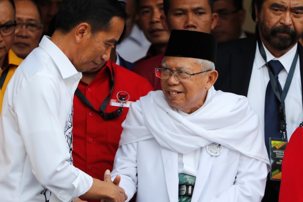 Indonesian President Joko Widodo with his vice-presidential running mate for the 2019 presidential election Islamic cleric Ma'ruf Amin in Jakarta. Photo: Reuters