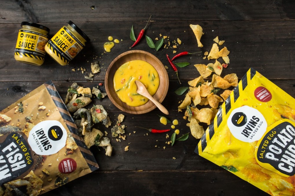 Irvin’s Salted Egg founder Irvin Gunawan believes salted-egg fish skins are a hit among tourists because they represent Singapore cuisine. Photo: Handout