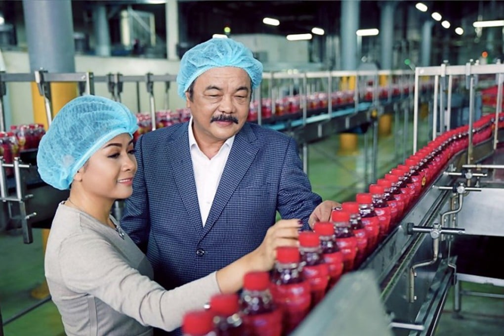 Tran Qui Thanh and daughter Phuong Uyen Tran at their Tan Hiep Phat Beverage Group factory in Vietnam. Photo: Tan Hiep Phat Beverage Group