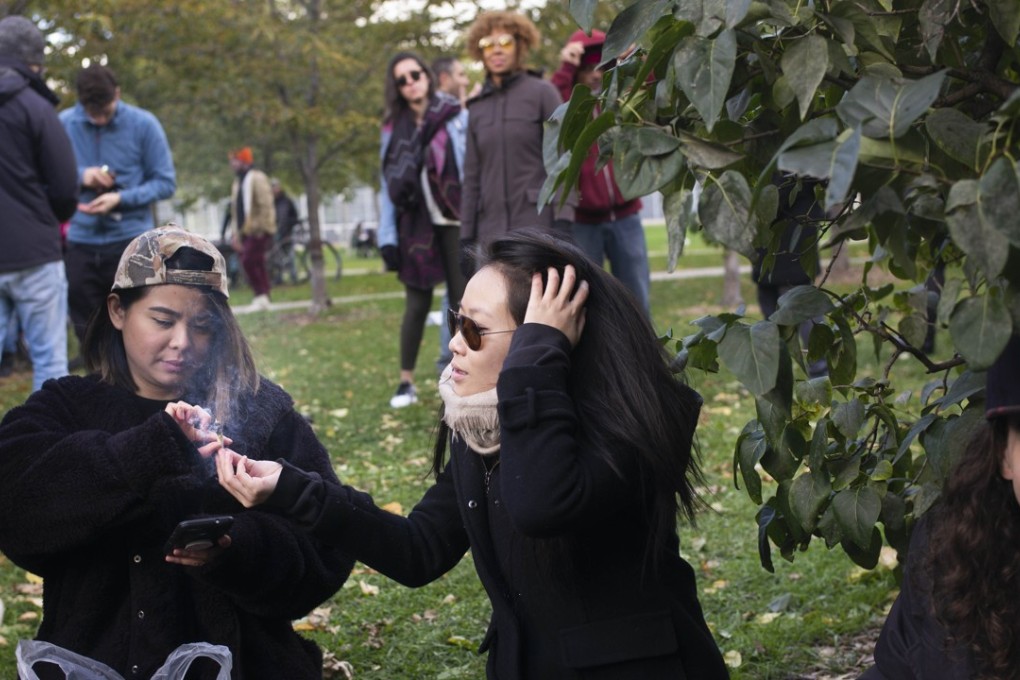Marijuana users enjoy a “smoke out” in a Toronto park following the change in the law. Photo: AFP