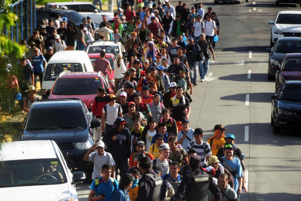 Salvadoran migrants gather in a caravan to start their journey towards the United States. Photo: AFP