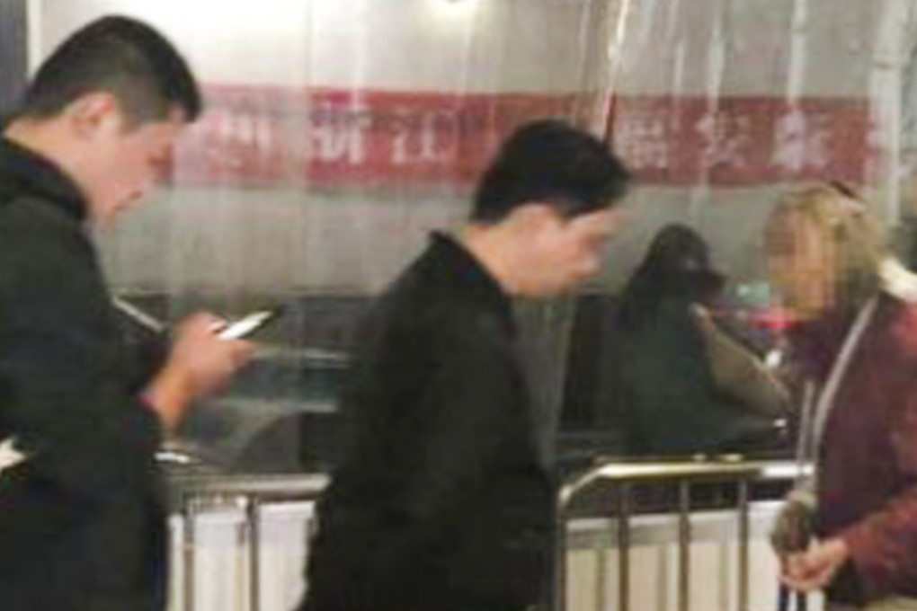 Hangzhou East railway station is telling passengers not to give money to the woman. Photo: Weibo