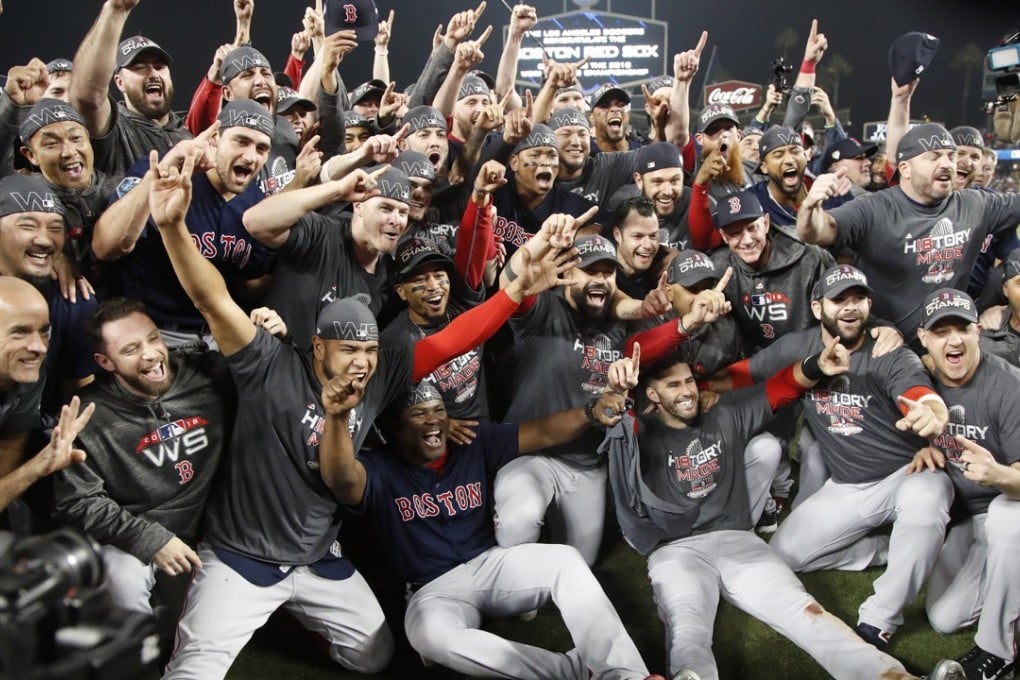 Boston Red Sox players celebrate after defeating the Los Angeles Dodgers in game five of the World Series to win the series 4-1 and become World Series champions. Photo: EPA