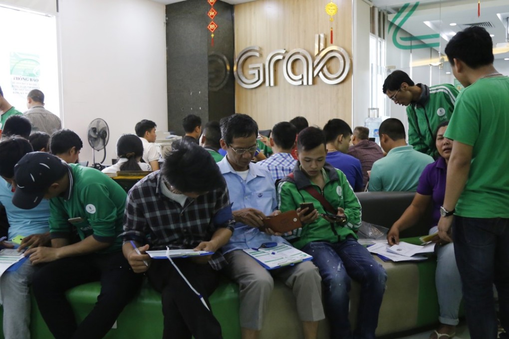 Singapore-headquartered Grab, which operates in 235 cities across Southeast Asia, is looking to transform itself into a leading consumer technology group. Photo: AP