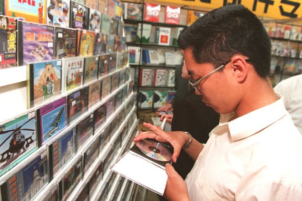 A man shops for Chinese-made computer software in Beijing, China, in 1996. Picture: AFP