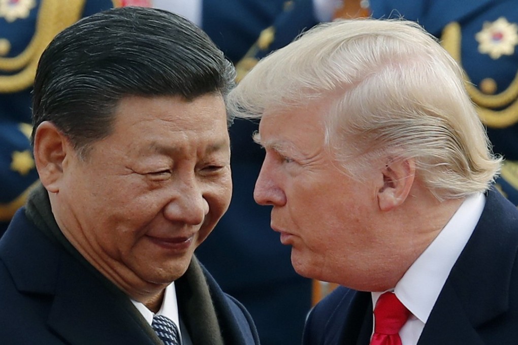 In this November 9, 2017, file photo, US President Donald Trump, right, chats with Chinese President Xi Jinping during a welcome ceremony at the Great Hall of the People in Beijing. Photo: AP