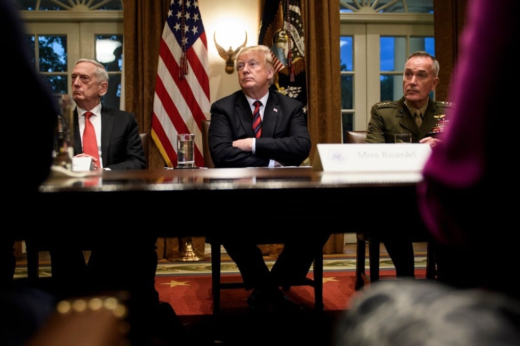 President Donald Trump at a meeting with military leaders in the Cabinet Room of the White House. Picture: AFP