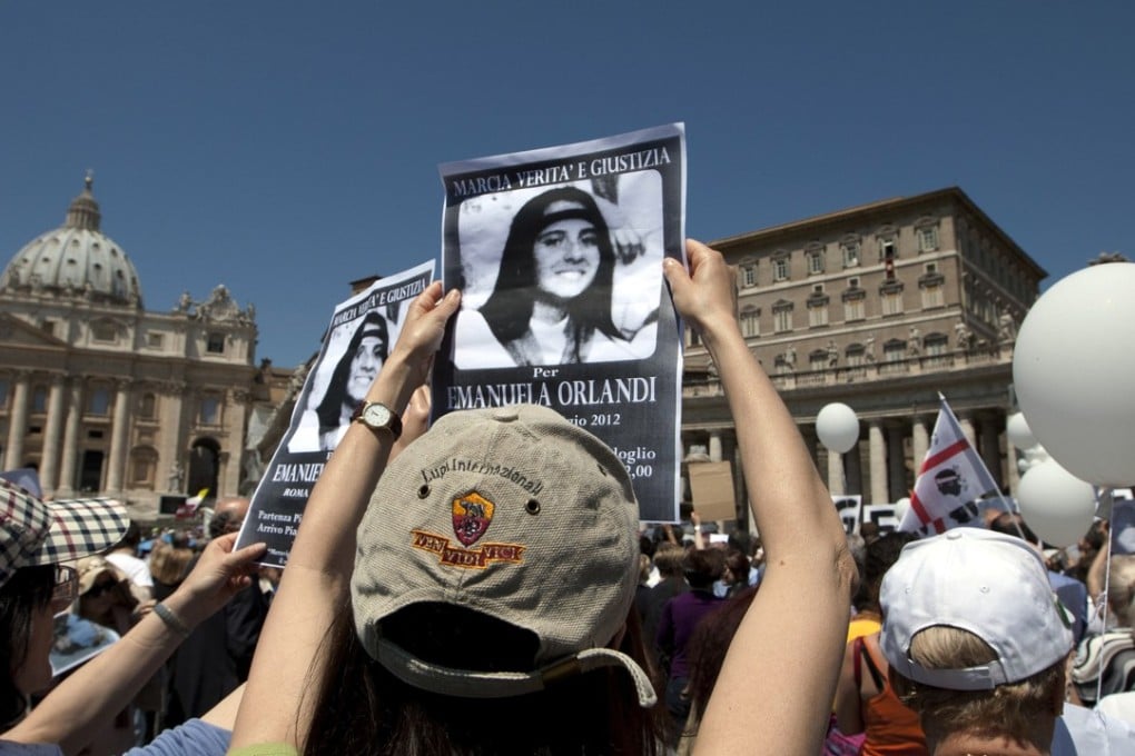 In this May 27, 2012, file photo, demonstrators hold pictures of Emanuela Orlandi in St Peter's square, at the Vatican. The Vatican says human bones were found during renovation work near its embassy to Italy, reviving speculation once again about the fate of Orlandi, the 15-year-old daughter of a Vatican employee who disappeared in 1983. Photo: AP