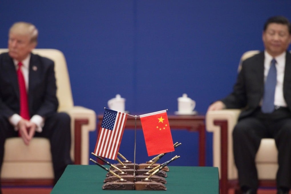 US President Donald Trump and Chinese President Xi Jinping attend a business leaders’ event inside the Great Hall of the People in Beijing on November 9, 2017. The conflict between the US and China has intensified in recent months. Photo: AFP