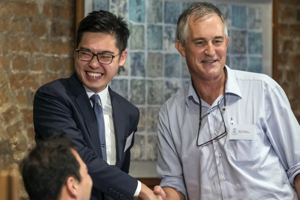 Victor Mallet’s (right) visa application was rejected after he hosted a talk at Hong Kong’s Foreign Correspondents’ Club by independence advocate Andy Chan Ho-tin (left). Photo: AP