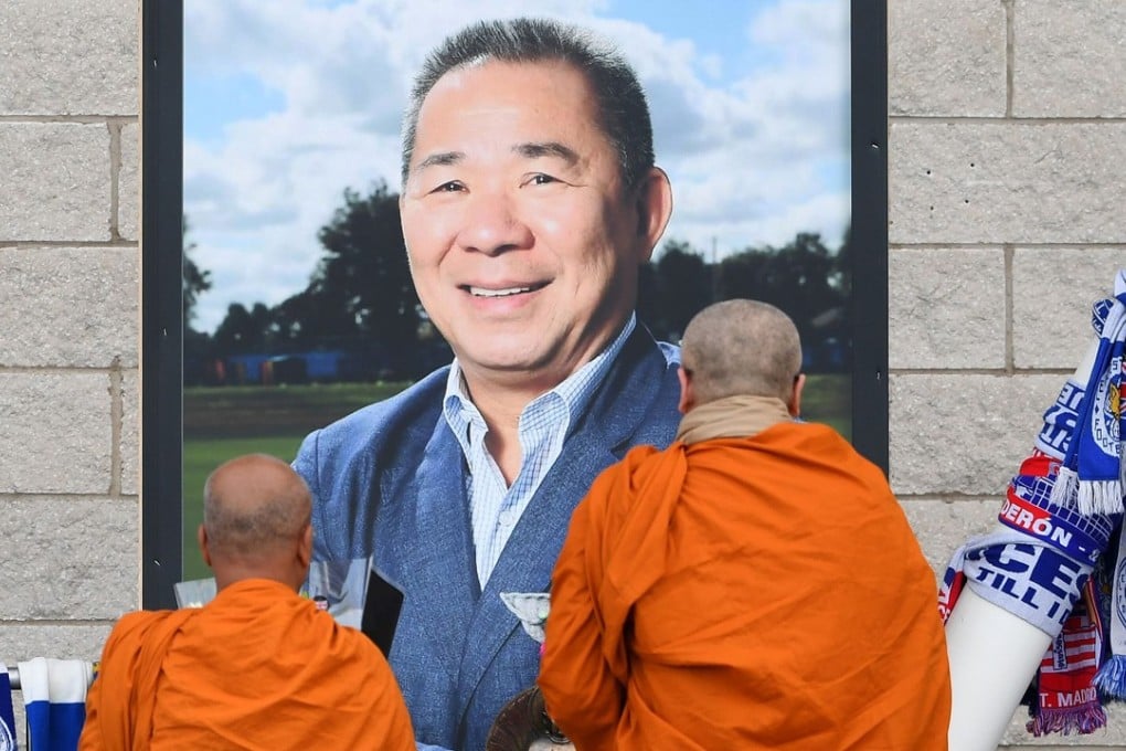 Buddhist monks lay tributes by a photograph of Leicester City’s Thai chairman Vichai Srivaddhanaprabha, outside the King Power Stadium. Photo: AFP