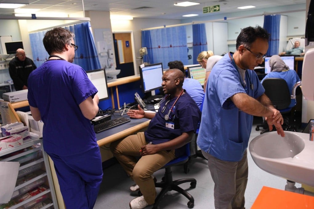 File photo of staff in the accident and emergency department of the Royal Albert Edward Infirmary in Wigan, northwest England. Photo: AFP