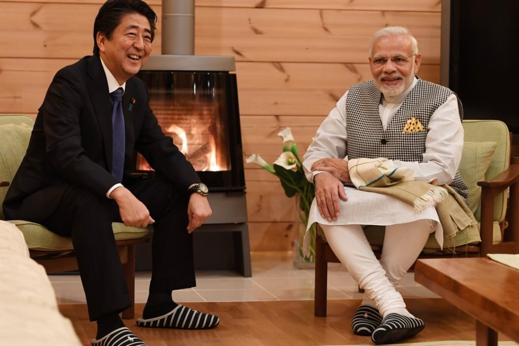 Japanese leader Shinzo Abe and his Indian counterpart Narendra Modi sit by the fire at Abe’s holiday home. The fact that the two leaders met at Abe’s residence has been highlighted as symbolic of their close relationship. Photo: Twitter