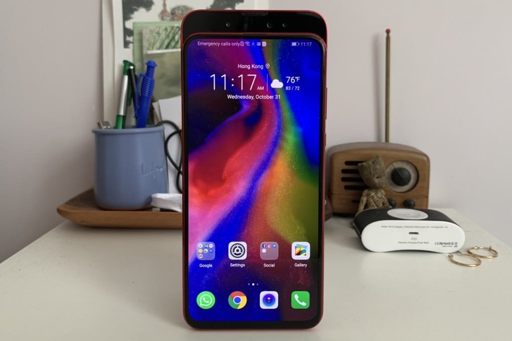 The Honor Magic 2 notchless slider phone with the screen down. The narrow back panel houses an earpiece, a 16-megapixel selfie camera and a pair of 2-megapixel depth sensors. Photo: Ben Sin