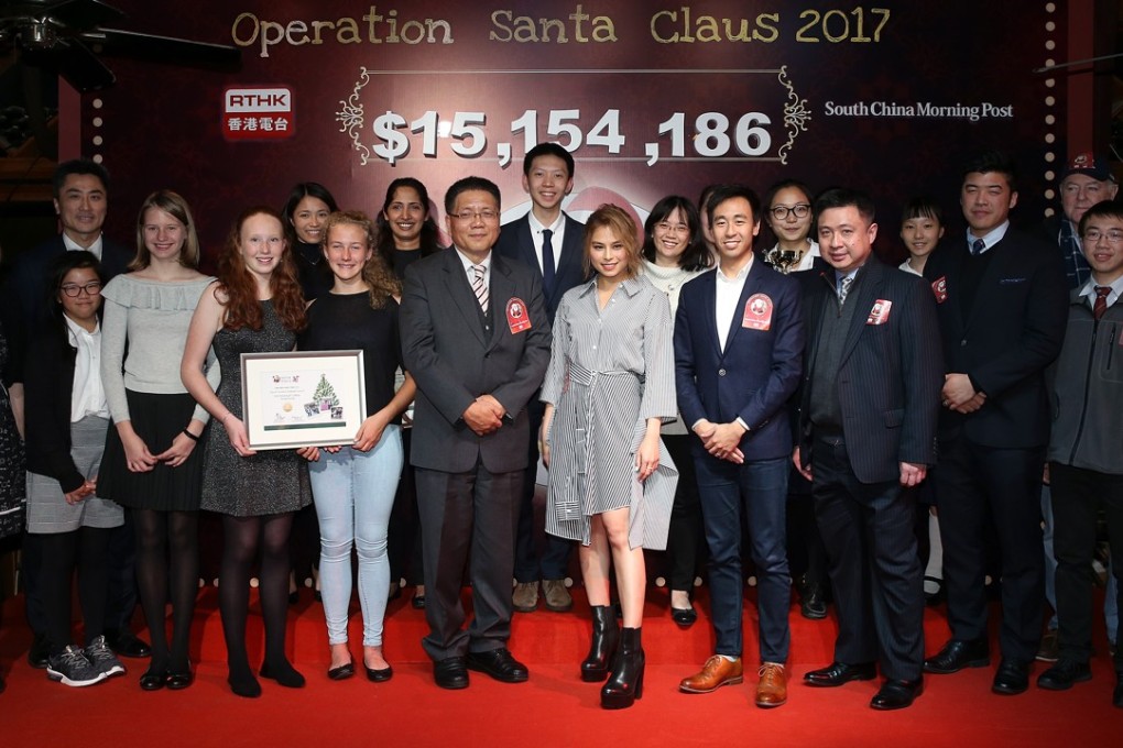 Front row, centre: Director of Broadcasting Leung Ka-wing, Operation Santa Claus Ambassador Gin Lee, and CEO of the South China Morning Post Gary Liu at this year’s OSC closing ceremony in January. Photo: Sam Tsang