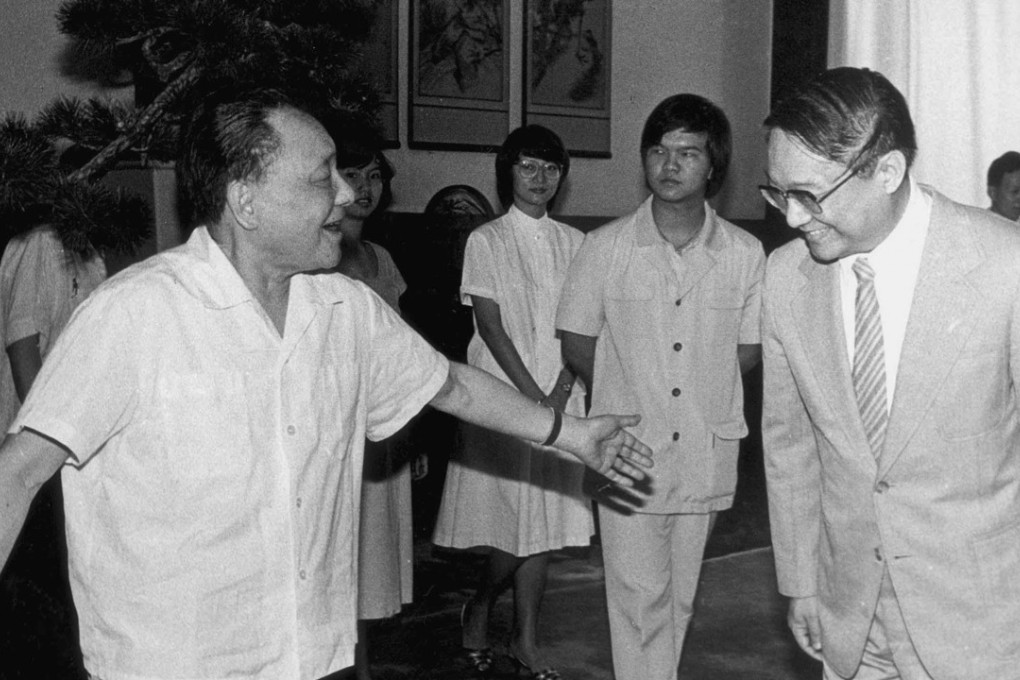 Chinese leader Deng Xiaoping meets Louis Cha in Beijing in 1983. Photo: China News Service