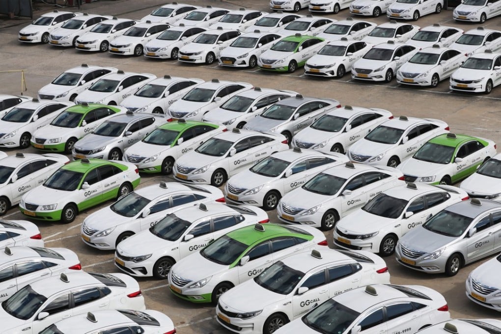 Taxis at a garage in Seoul, as their drivers join a protest against the carpooling service of Kakao. Photo: EPA