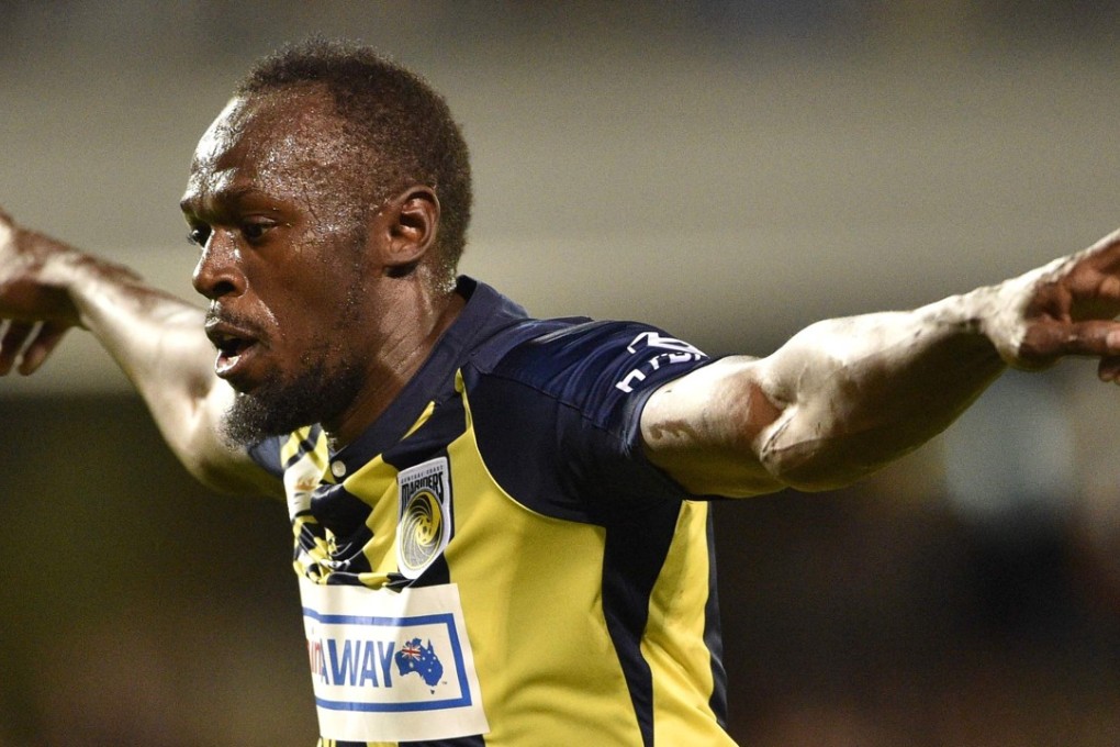 Usain Bolt celebrates scoring for A-League club Central Coast Mariners in his first competitive start against Macarthur South West United in Sydney. Photo: AFP