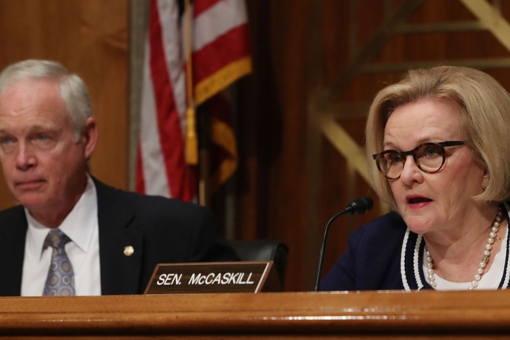 Senator Claire McCaskill, a Missouri Democrat, speaks while flanked by Republican Chairman Ron Johnson of Wisconsin during a Senate Homeland Security and Governmental Affairs Committee hearing in Washington on October 10. Both senators have demanded an investigation into claims that Chinese spies potentially compromised Apple and Amazon by infiltrating a motherboard factory. Photo: Getty Images via AFP