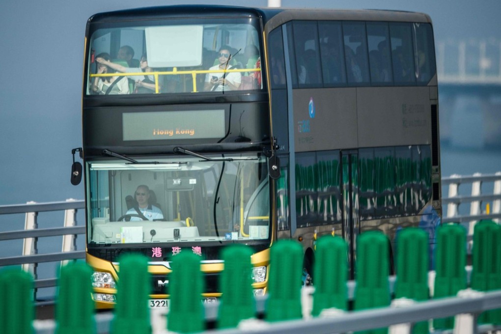 A bus from Hong Kong passes along the Hong Kong-Macau-Zhuhai Bridge on October 24. Photo: AFP