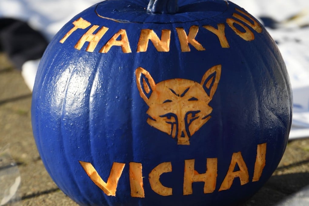 A pumpkin painted blue and carved with the message ‘Thank You Vichai’ is seen among the tributes gathered outside Leicester City’s King Power Stadium, in honour and remembrance of those who died in a helicopter crash including the club's Thai chairman Vichai Srivaddhanaprabha. Photo: AFP